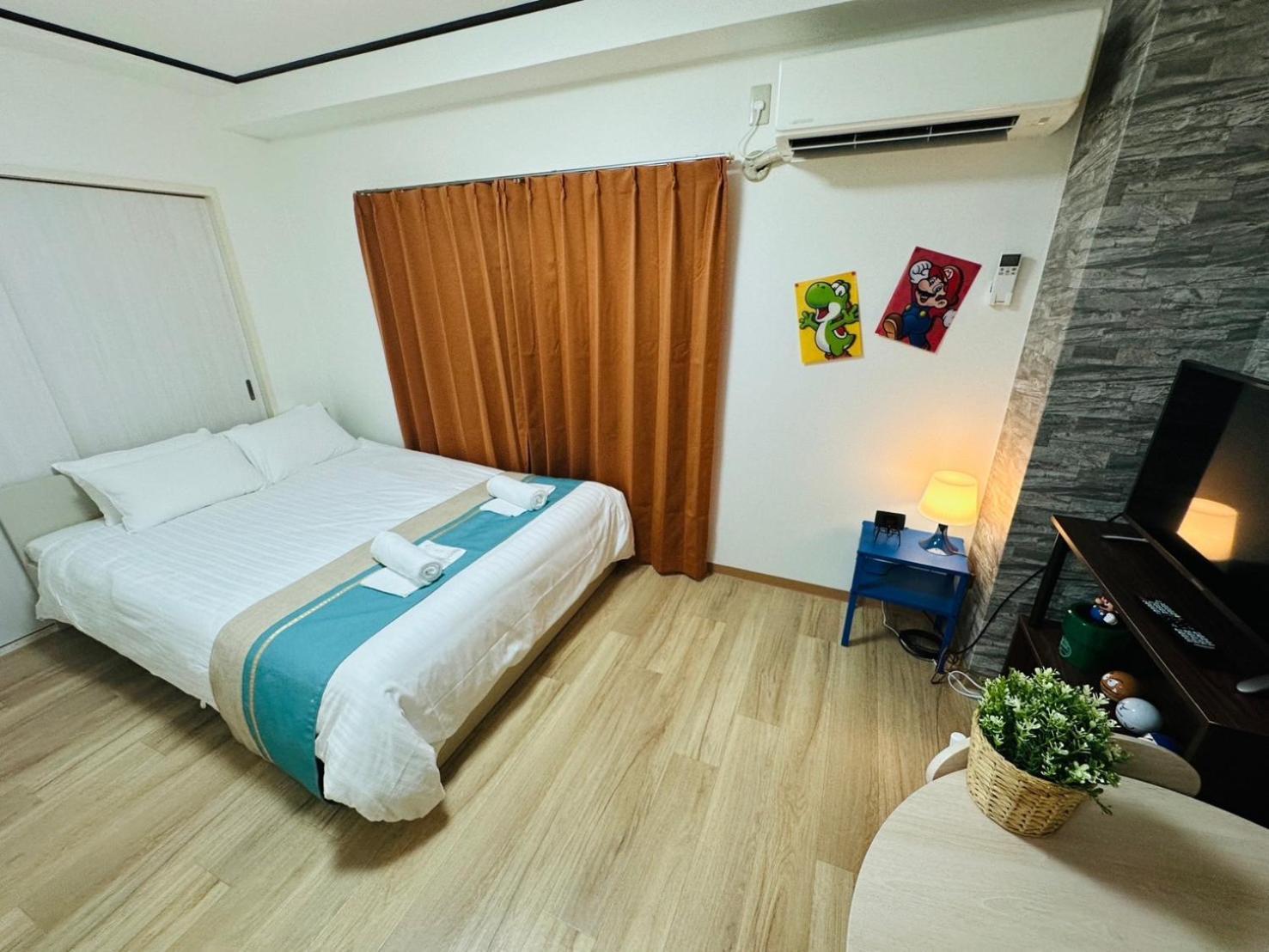 Apartment 303黒門市場すぐ30秒!道頓堀まで徒歩8分!でんでんタウン徒歩3分!通天閣徒歩9分!観光に最高! *