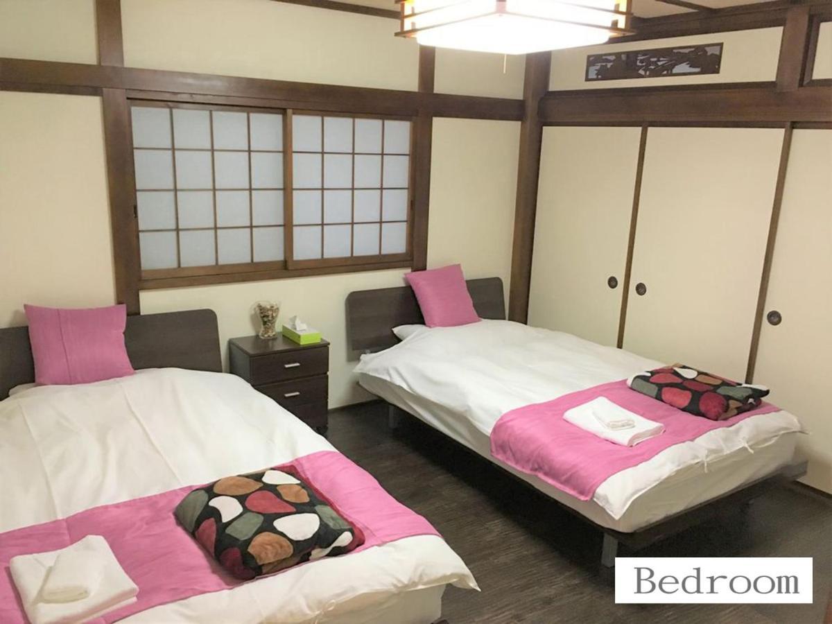 Holiday home 北巽サクラハウス一軒家 Sakura House Kitatatsumi 最大16名 Osaka