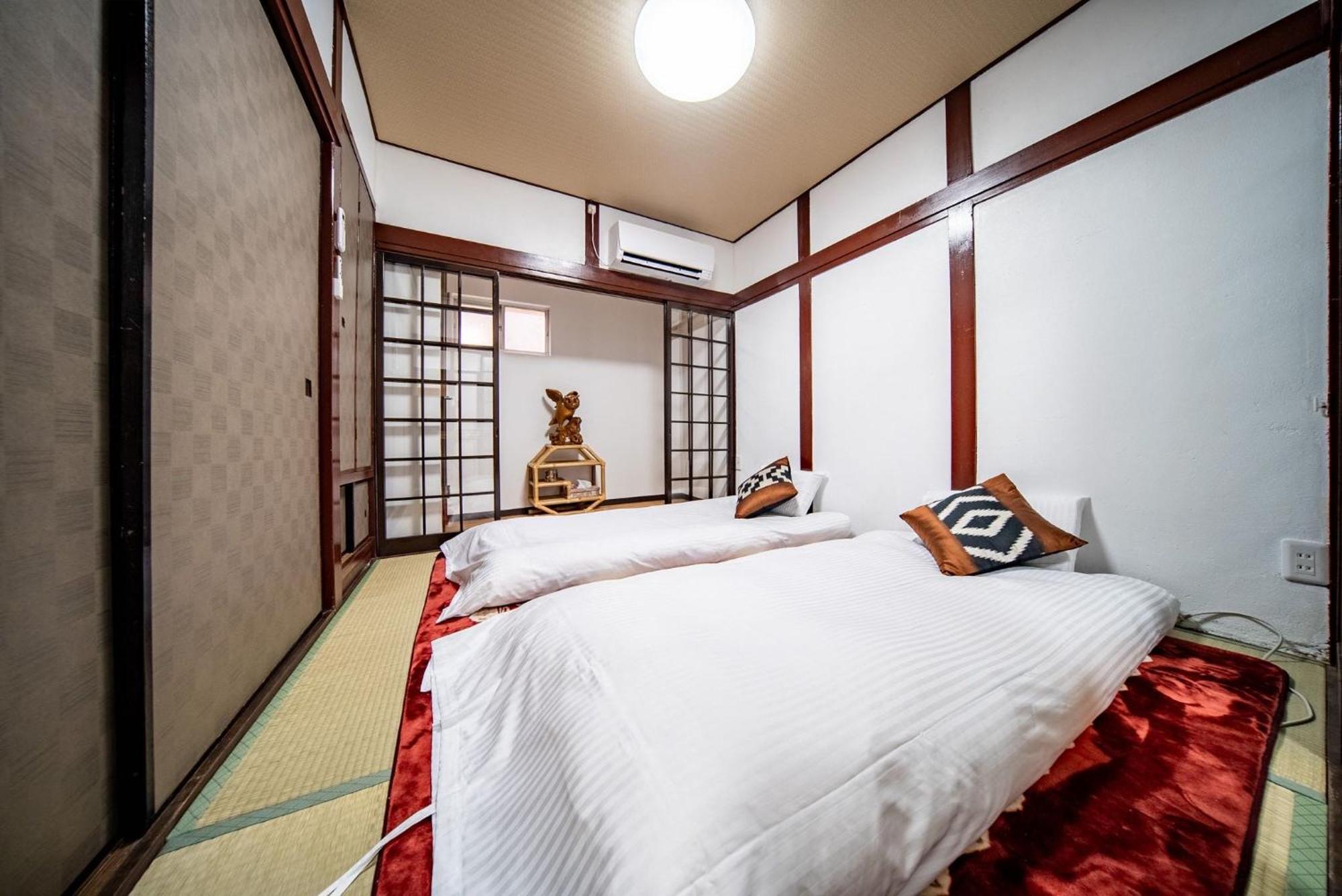 Apartment 梟の宿 岛之内5号馆 步行200m至道顿堀! 徒步5分钟日本桥站! 心斋桥8分钟 黑门市场15分种徒步圈内 !中央区古风民宅77平方2间房可住7人 *