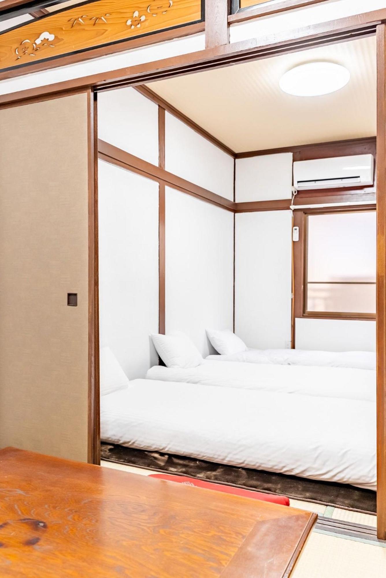Apartment 梟の宿 岛之内5号馆 步行200m至道顿堀! 徒步5分钟日本桥站! 心斋桥8分钟 黑门市场15分种徒步圈内 !中央区古风民宅77平方2间房可住7人 Osaka