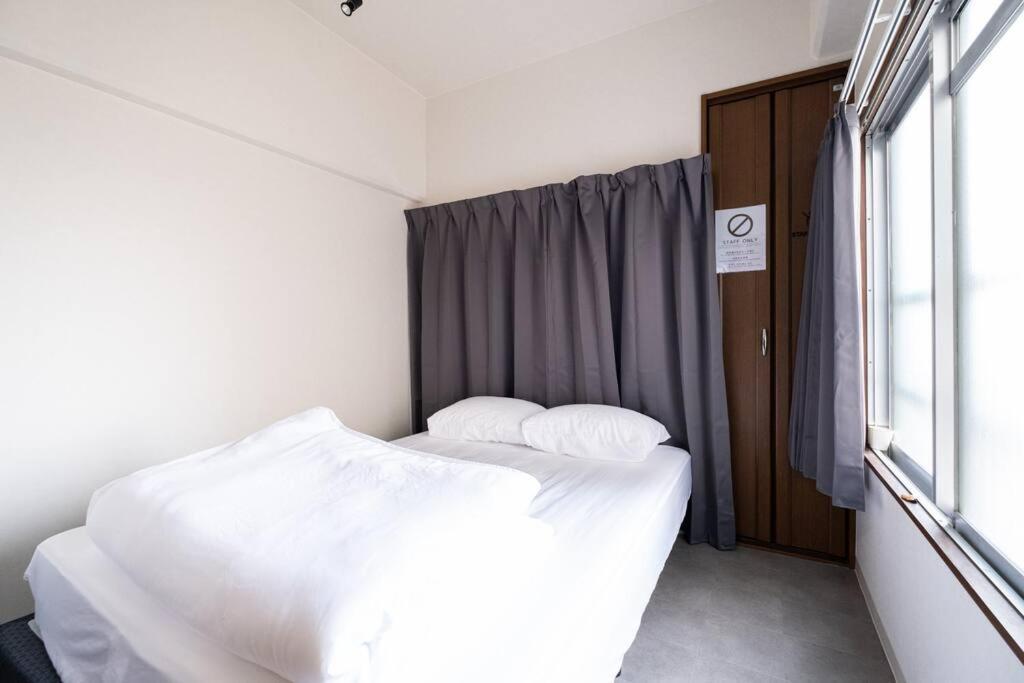 Apartment Tasoneurbanstayosaka なんば日本橋南不夜城702 *